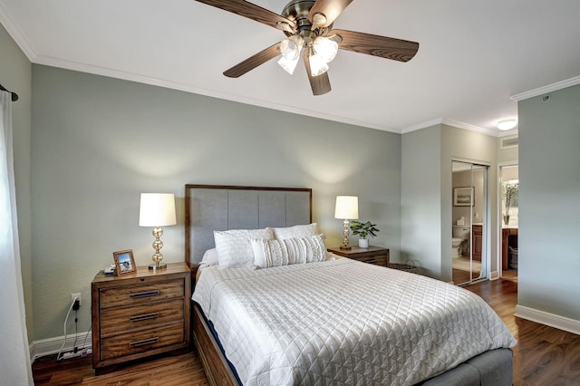 bedroom featuring ceiling fan, connected bathroom, ornamental molding, dark hardwood / wood-style flooring, and a closet