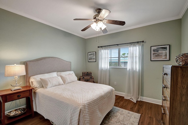 bedroom featuring dark hardwood / wood-style flooring, crown molding, and ceiling fan