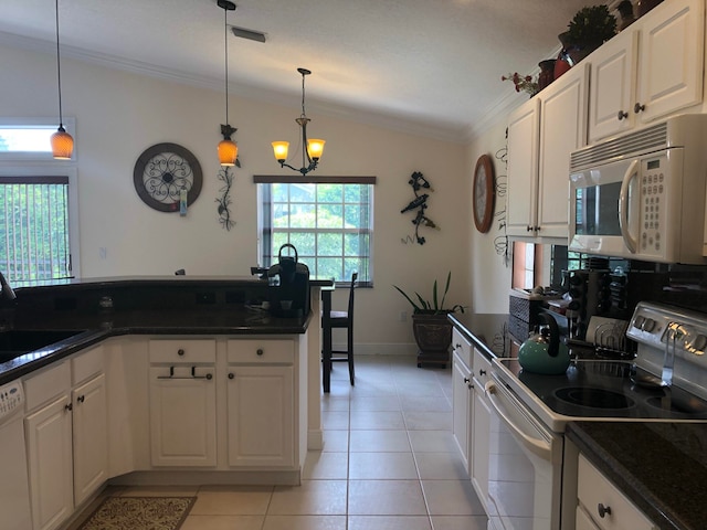 kitchen with white cabinetry, sink, vaulted ceiling, white appliances, and light tile patterned flooring