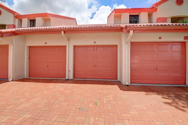 exterior space with a garage