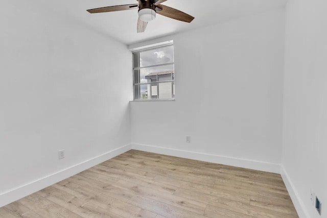 unfurnished room with ceiling fan and light hardwood / wood-style floors