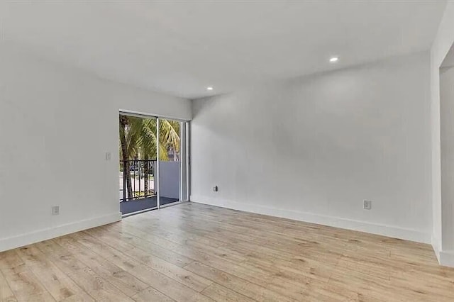 empty room with light wood-type flooring