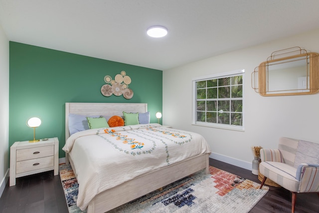 bedroom featuring dark wood-type flooring