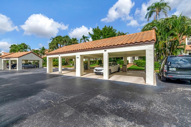 view of partially covered parking lot