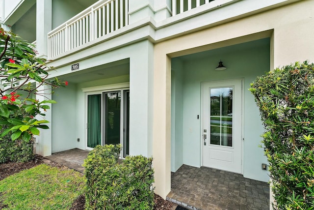 doorway to property with a balcony