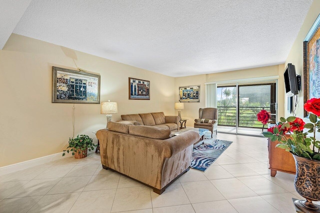 tiled living room with a textured ceiling