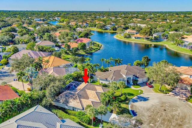 birds eye view of property featuring a water view