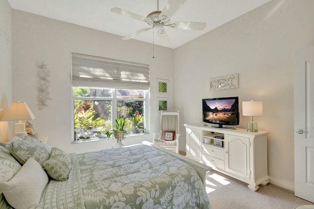 bedroom with light colored carpet and ceiling fan