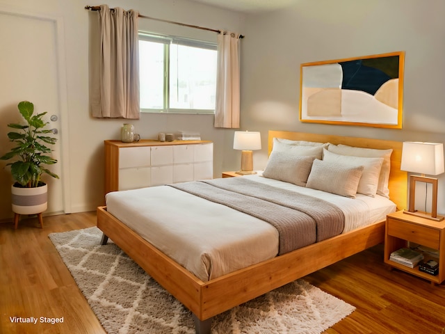 bedroom featuring light wood-type flooring