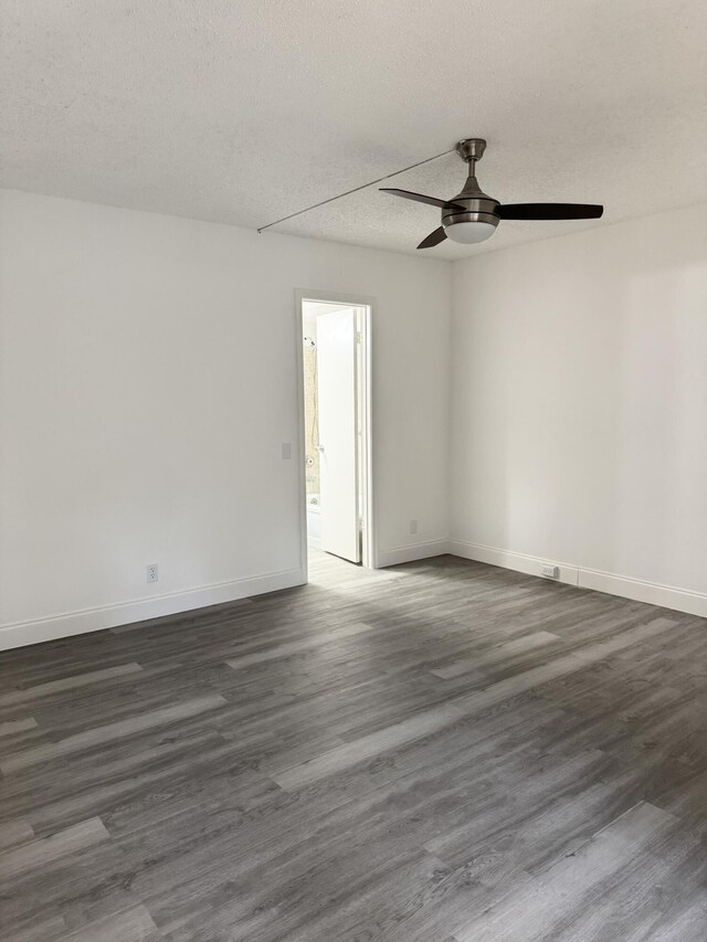 unfurnished bedroom with ceiling fan, carpet floors, and a textured ceiling