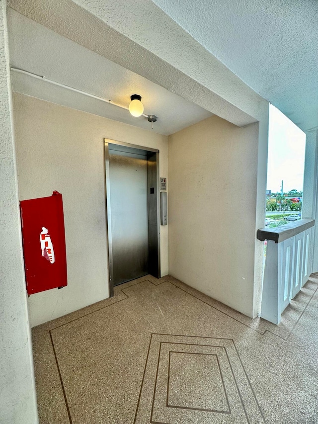 doorway to property with elevator