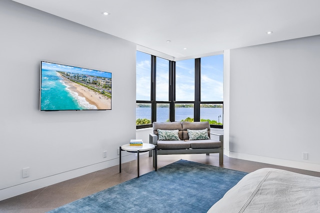 bedroom featuring a wall of windows