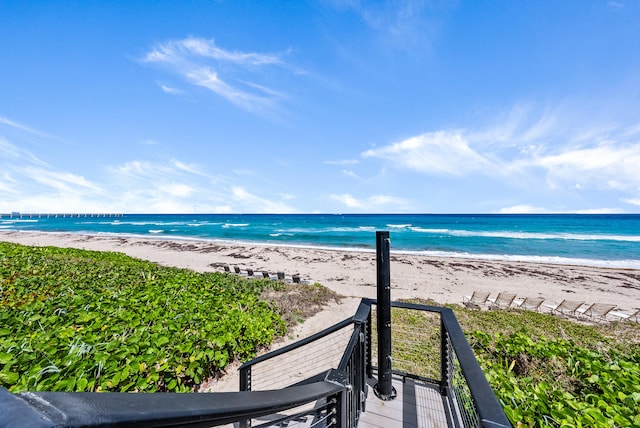 view of water feature with a beach view