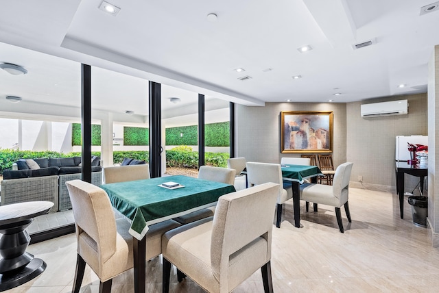 dining room with a wall unit AC