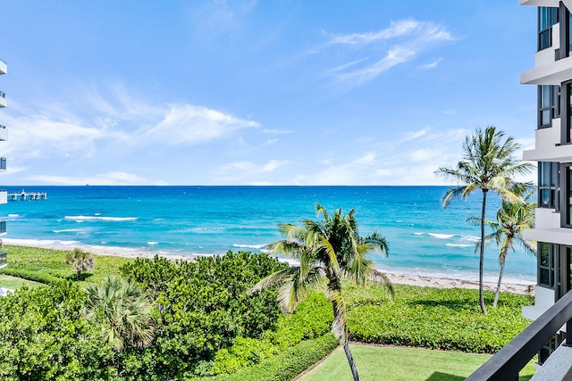 view of water feature with a beach view