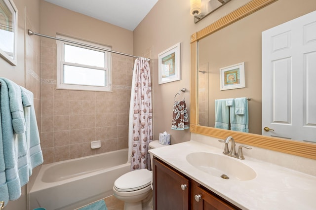 full bathroom with tile patterned flooring, vanity, toilet, and shower / bath combo with shower curtain