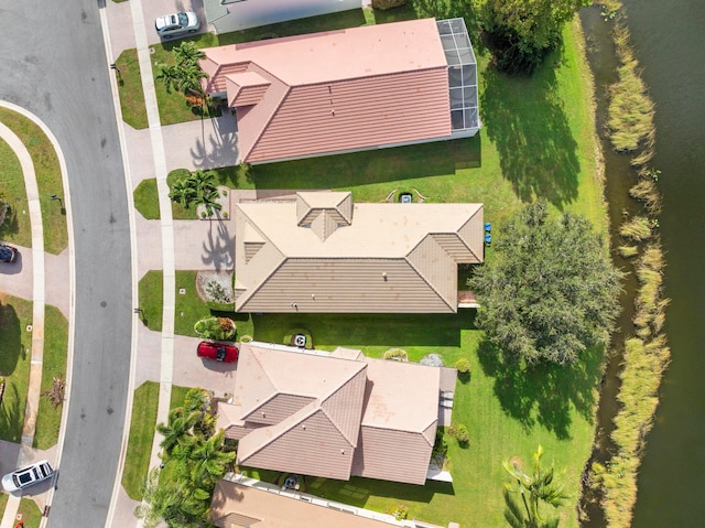 drone / aerial view with a water view