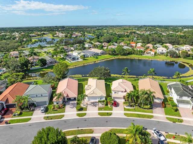 bird's eye view with a water view