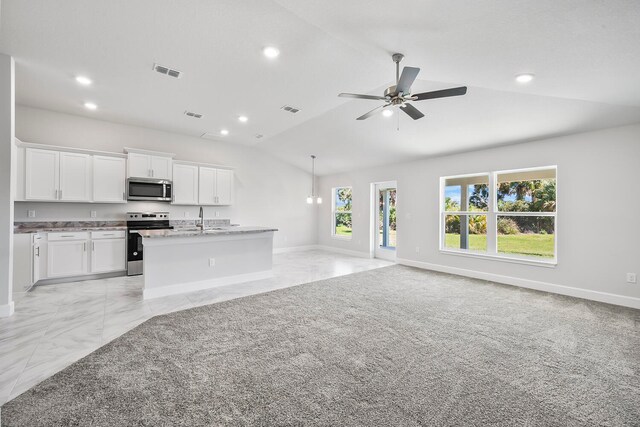 unfurnished living room with ceiling fan, light colored carpet, lofted ceiling, and sink