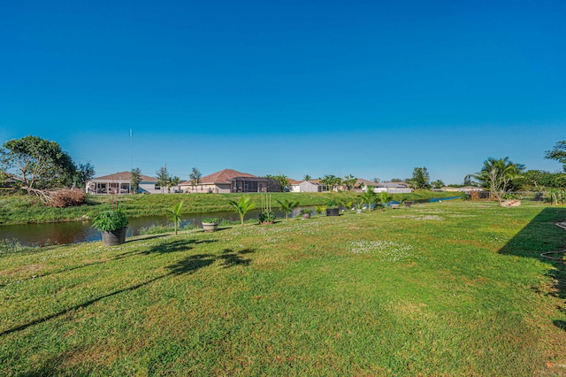 view of yard with a water view