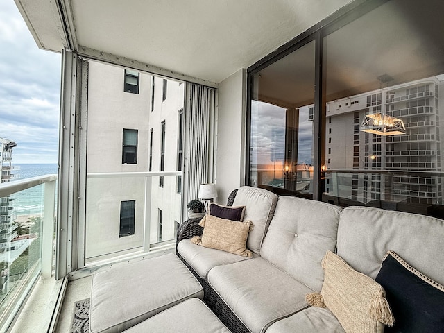 balcony featuring a water view