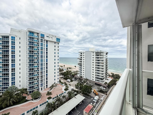 exterior space with a beach view and a water view