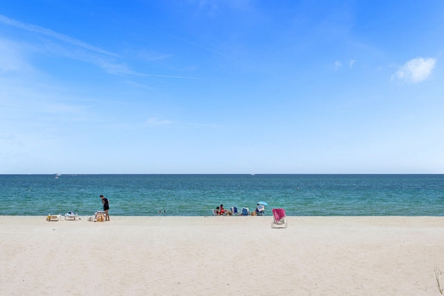 property view of water featuring a beach view