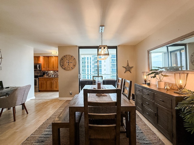 dining area featuring light hardwood / wood-style floors