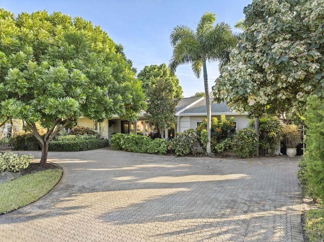 view of property hidden behind natural elements