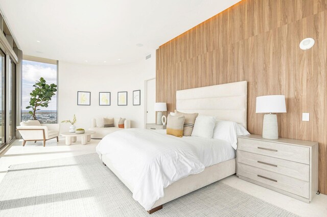 bedroom with wooden walls