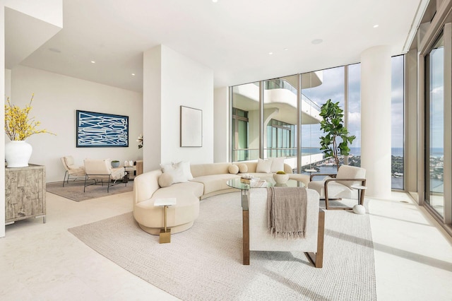 living room featuring expansive windows and a wealth of natural light