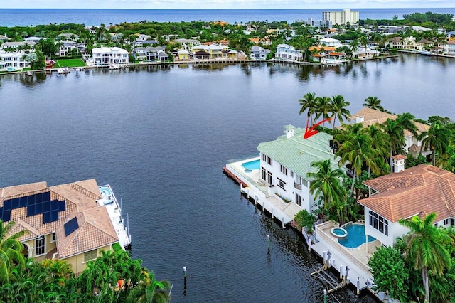 aerial view featuring a water view