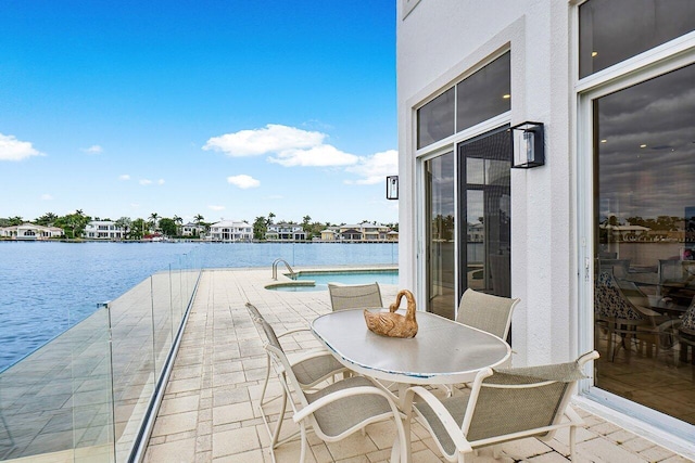 view of patio / terrace with a water view