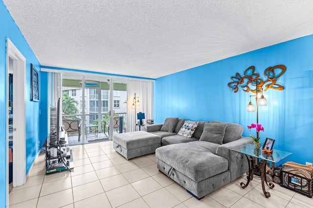 living room featuring light tile patterned floors and a textured ceiling