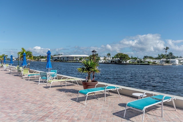 view of patio featuring a water view