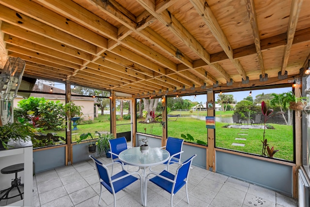 unfurnished sunroom featuring a healthy amount of sunlight