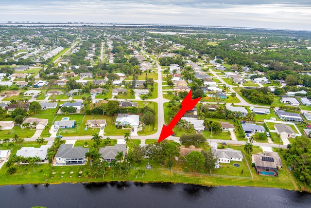 drone / aerial view featuring a water view