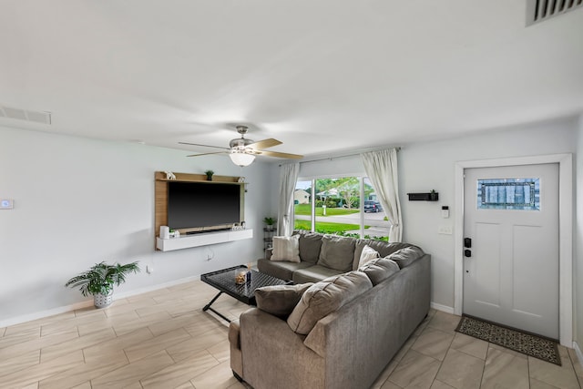 living room with ceiling fan