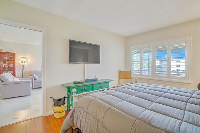 bedroom featuring light hardwood / wood-style floors