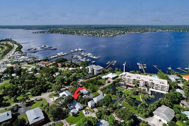 birds eye view of property featuring a water view