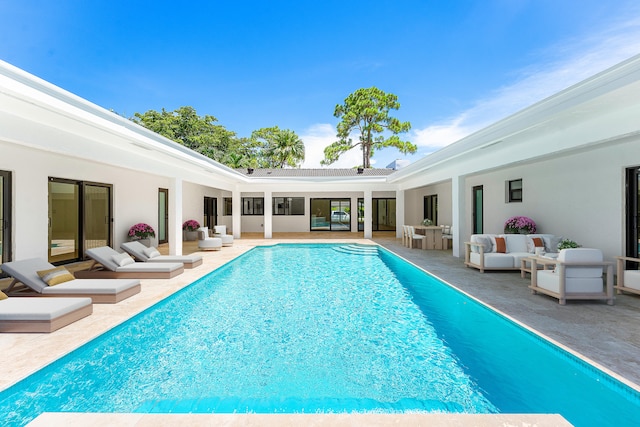 view of pool featuring an outdoor hangout area and a patio area