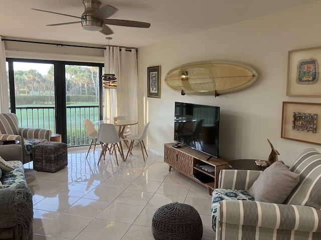 tiled living room with ceiling fan