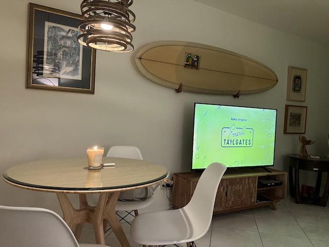 dining area with light tile patterned floors