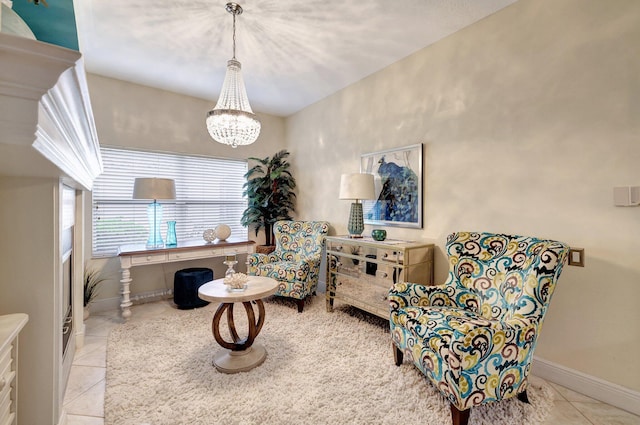 living area with light tile patterned flooring and a chandelier