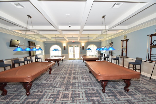 playroom featuring coffered ceiling, dark colored carpet, french doors, ornamental molding, and beamed ceiling