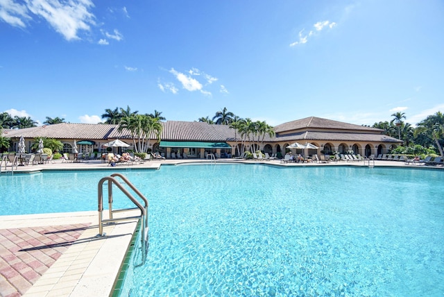 view of pool featuring a patio area