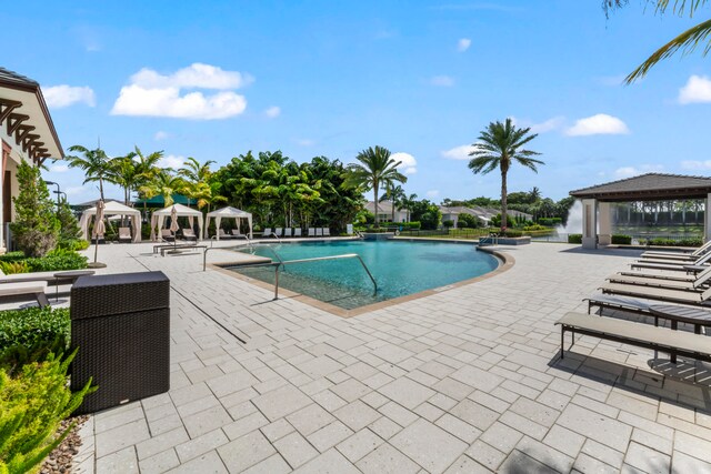 view of pool with a gazebo and a patio