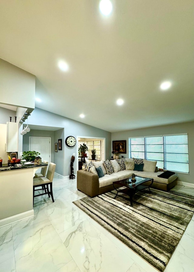 living room with lofted ceiling