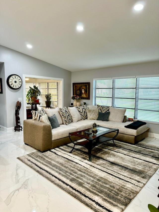 living room with vaulted ceiling