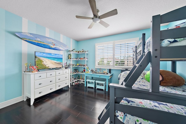 bedroom featuring ceiling fan, dark hardwood / wood-style flooring, and a textured ceiling